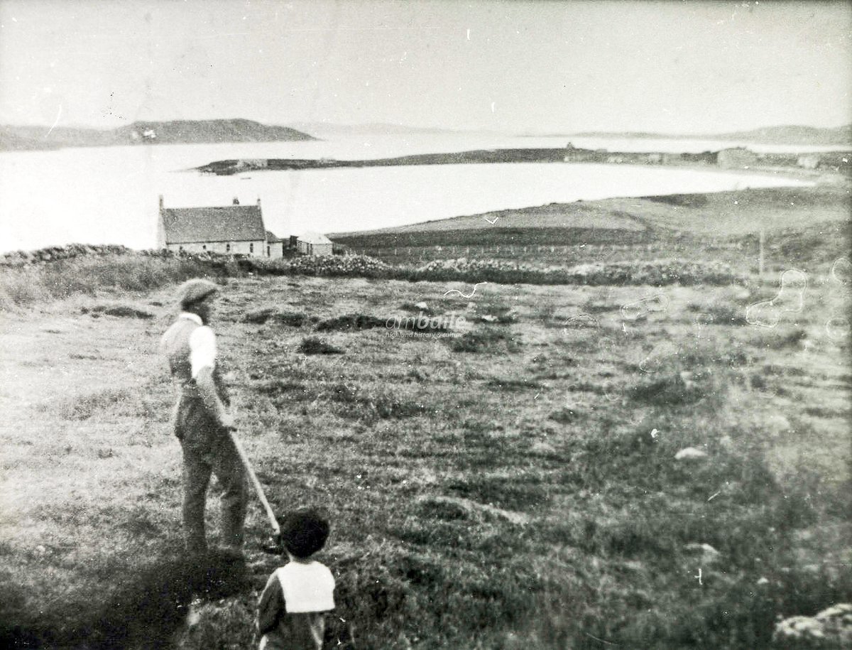 Man and a boy working in field overlooking #Aultbea, undated [photo from the collections @GairlochMuseum]