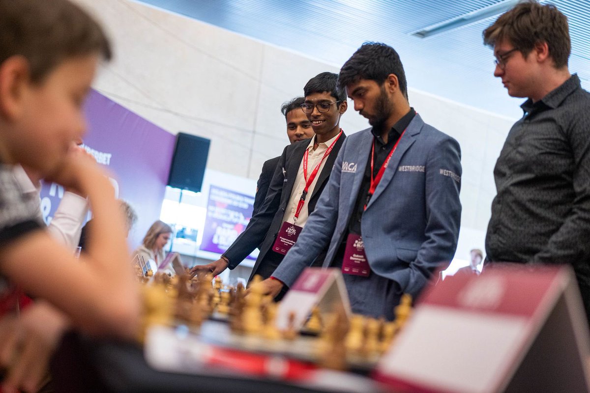 Cheers to @DGukesh @ArjunErigaisi, and @rpraggnachess as they make waves at the @GrandChessTour in Warsaw, Poland! It is the first time in the history of GCT, three Bharatiya are playing. Their participation adds a thrilling twist to the chess world. Let's root for our Bharataiya