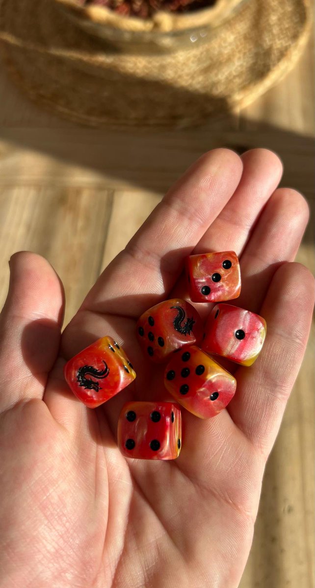 Have you ever wanted to hold fire in your hands? 🔥

This weekend we're selling some of our Welsh "Dragonfire" dice which the team are using this season. You can see model <a href="/ojay180/">Jude Ogbeh</a> showing off the goods*.

Only £10 for 10! DM for details. Available to collect at the #aosWelshOpen