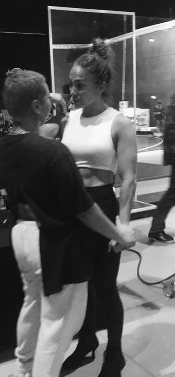Just JLo and dang, look at those muscles.