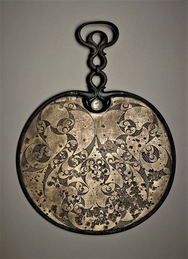 The beautiful Desborough Mirror in the @britishmuseum dates to c50BC-AD50, just before the #Romans arrived. It is made from highly polished bronze & the reverse, shown in these images, was engraved with a highly complex design, a style unique to Britain at this time.