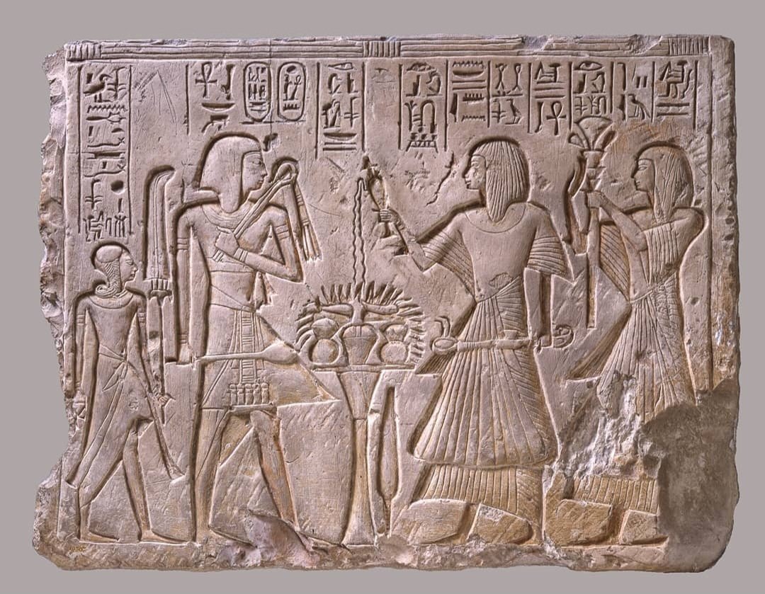 Stela: Seti I at left with mace in right hand and crook and whip in left. Behind stands Rameses II as prince, with side lock and fan of plumes. Amenwahsu stands right of offering table, also Tiya royal scribe 🇪🇬

Materials: Limestone, Paint.

#ancientegypt