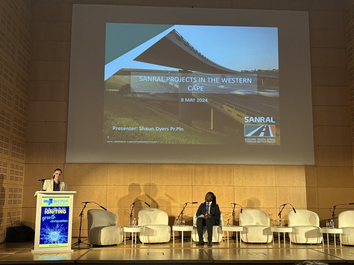 PropertyWheel's tweet image. Shaun Dyers, Town/Regional Planner for @SANRAL_za discussing its planned upgrades to the #WesternCape’s roads at the 11th annual @WCPDFconference.

#SANRAL #WCPDF2024 #infrastructure #propertydevelopment #construction #builtenvironment