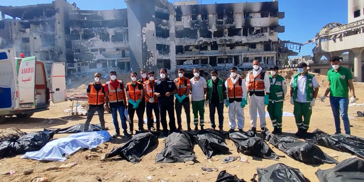 Dr. Motasem Salah, representing Gaza’s health authority’s emergency crew committee, reveals the finding of a third mass grave near Shifa Hospital following Israel’s attack on the hospital. So far, 49 bodies have been unearthed, with efforts underway to recover more bodies.