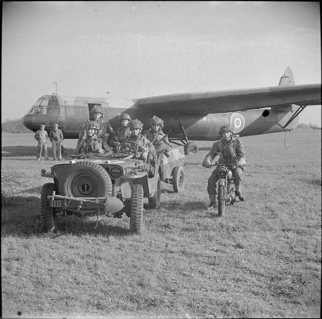 British Army loaded up with an Airspeed Horsa looming! #vintage #wednesdayvibes #legends #history .................... Happy Wednesday! #wednesday .................... 📸 Unknown #jeep #jeeplife #legendary1941