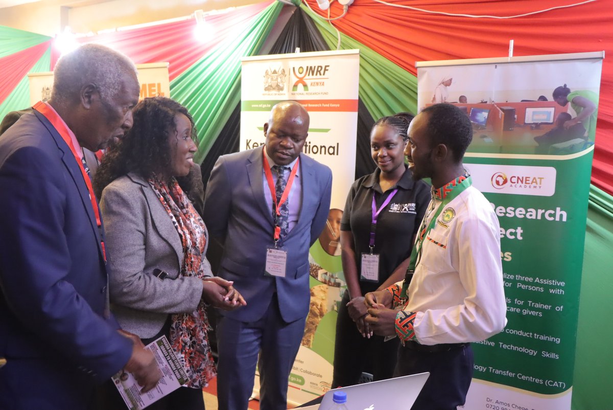 Dr Beatrice Inyangala, PS State Department of Higher Education and Research engages with a researcher during the #RSTIConference2024 #STIForSustainableProsperity