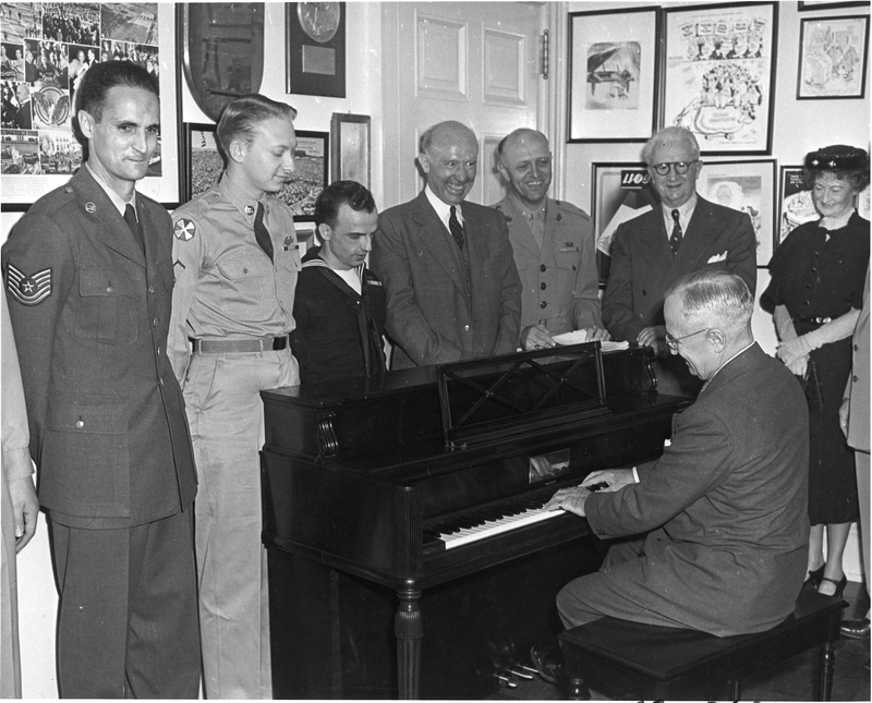 Join us in honoring President Harry S. Truman today on his 140th birthday. President Truman was an avid pianist and is seen here playing at the White House on May 9, 1951. Behind Truman is 21st Marine Band Director Lt. Col. William F. Santelmann, third from right. #marineband