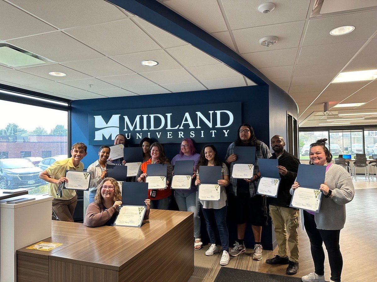 The Midland University Teacher Career Ladder undergraduates in cohort 6 from Omaha Public Schools, are awarded a special certificate from Mrs. Latasha Muhammad to celebrate the completion of the 2-year program.