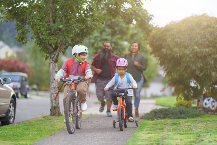 Biking and walking to school is a great way for kids to be physically active. 🚲 Learn how communities can make it easier for people to walk, bike, roll, or take transit to help increase physical activity: bit.ly/3Ik2Lrz #BikeRollToSchoolDay