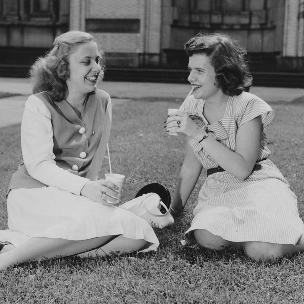 We hope you're enjoying this beautiful day as we get ready for commencement! @CarnegieMellon 👩‍🎓🌞👨‍🎓 'Two students sitting in the campus lawn.' (c.1945) Image found in the University Archives, available online via our Digital Collections.