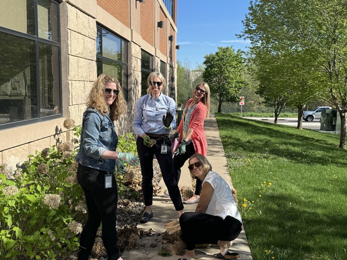 ⁦@ISD728⁩ District Office landscaping crew making our grounds a happy place!