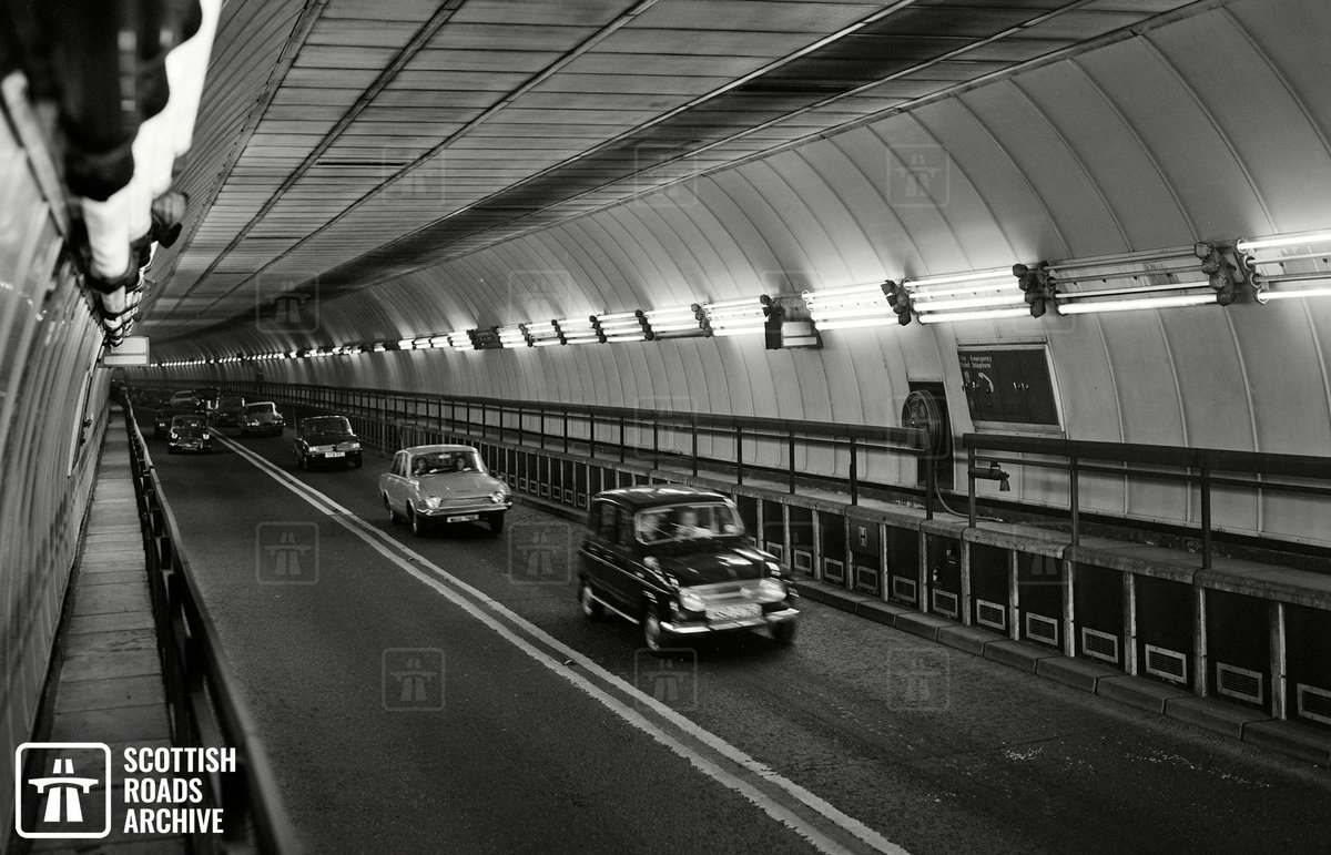 This week's #carspotting is back in #Glasgow down in #ClydeTunnel. This pic, dating back over 50 years, captures not only the tunnel's old features (note the lighting system!), but also many cool cars - which ones can you name? 🚗🚗🚗

#Archives