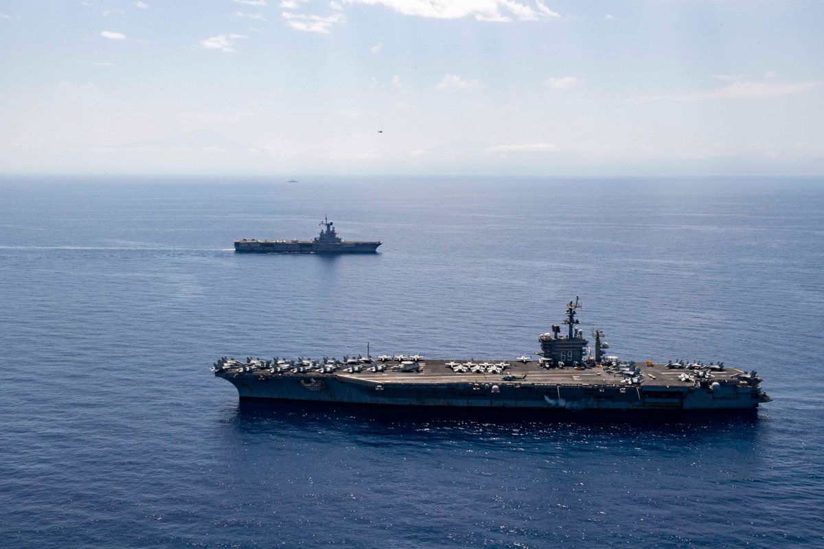 The Nimitz-class aircraft carrier USS Dwight D. Eisenhower (CVN 69) and the French aircraft carrier FS Charles De Gaulle (R91) participate in a photo exercise in the Mediterranean Sea.  
#alliesandpartners #nuclearfleet  #unmatchedpropulsion #harnesstheatom