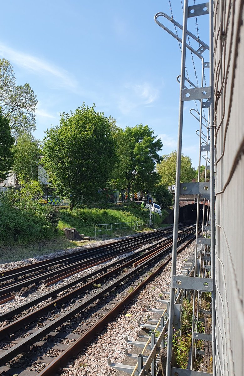 The District Line is suspended between Wimbledon & Parsons Green due to a vehicle on the embankment between Southfields & East Putney.