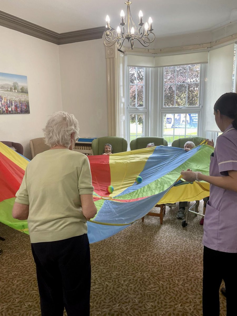 A group game using our play parachute provided lots of fun for our residents yesterday! 🪂

They practiced hand-eye coordination as they kept the ball off of the ground, whilst working their arms to keep the parachute moving! 💪🏼

#carehome #games #exercise #residentialcare
