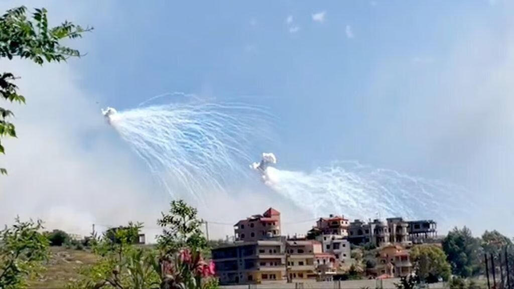 Israeli attack in Lebanon. I'm pretty sure that this is white phosphorus which is restricted under international humanitarian law. It must never be fired at or in close proximity to a populated civilian area or civilian infrastructure. Clearly, the Israelis break the law.