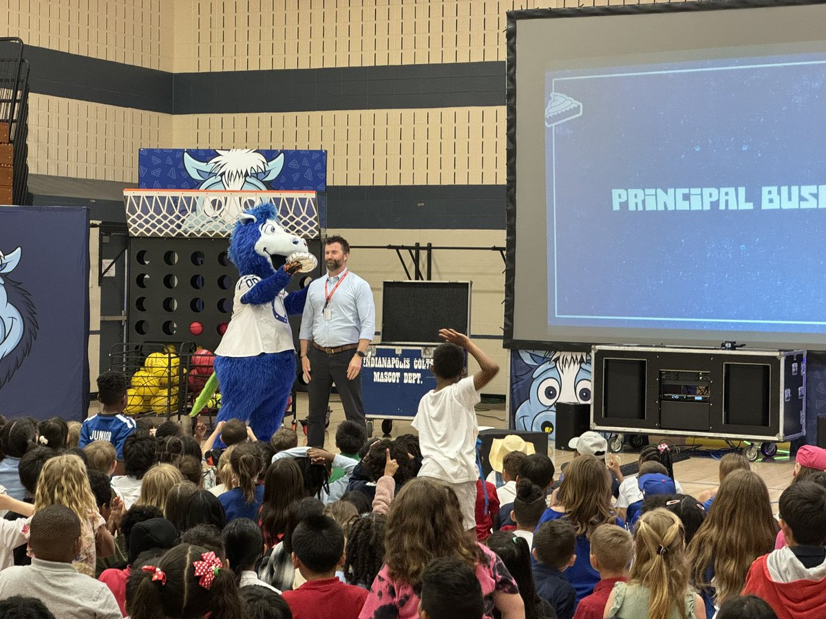 Jefftspencer's tweet photo. Principal @mbush36 takes a pie in the face from @blue Exciting day for RPE students. Thanks to @Colts for spending time in @perrytwpschools educating, entertaining, and celebrating our students! https://t.co/V42CJqyfNp