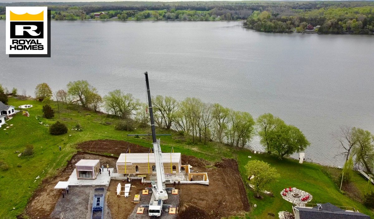 Our clients David & Kristi are going to have the incredible wide views of Hay Bay they wanted! The first of 3 prefab modules is on a new foundation. 🔨🏠 royalhomes.com/model/royal-q-… 1-800-265-3083 #CustomHomeDesign #since1971 #custombuilder #bayofquinte