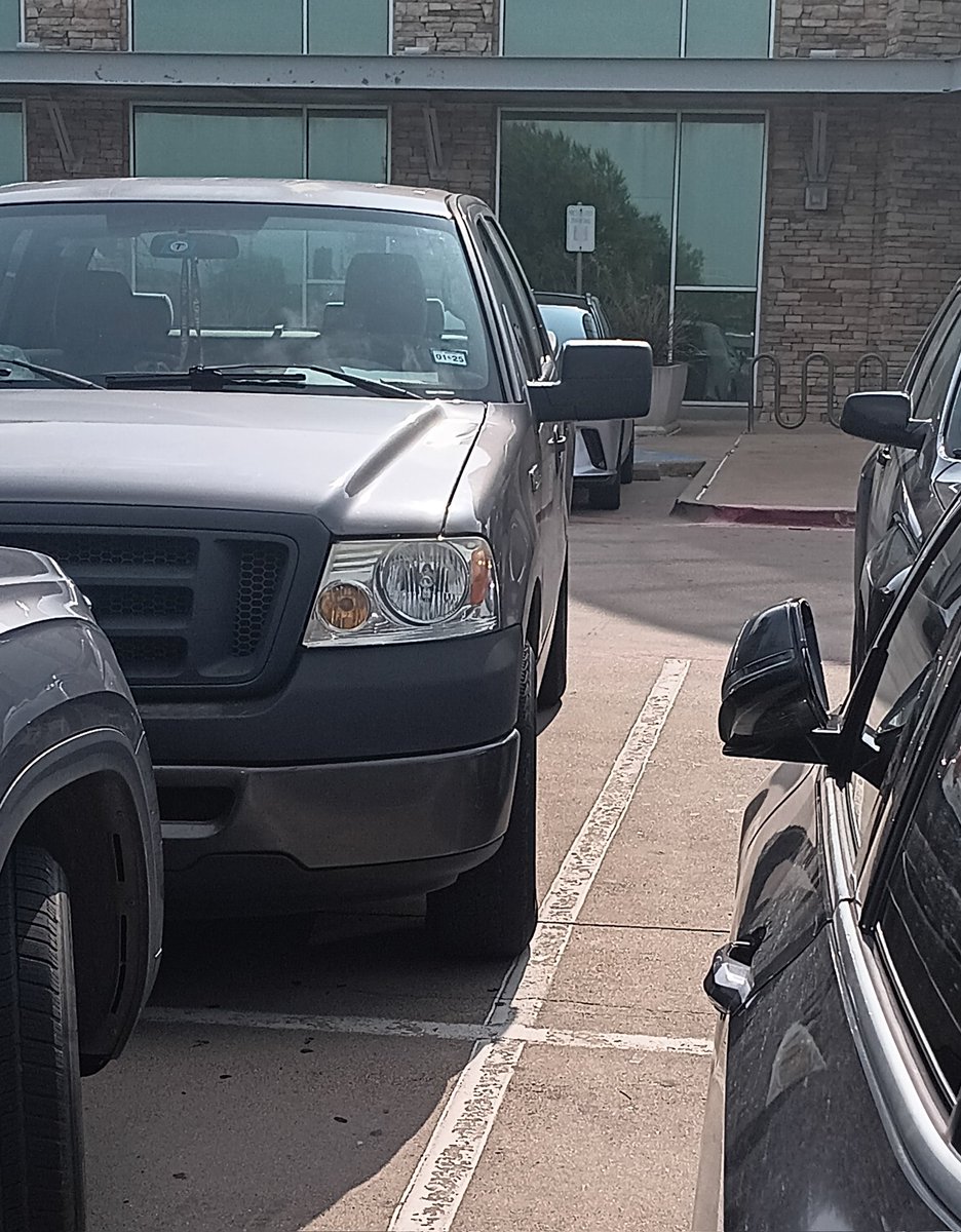 Sometimes, when I park, I 'help' out other visitors by pushing in their sideview mirrors, in case they forgot to. Especially if they parked like this