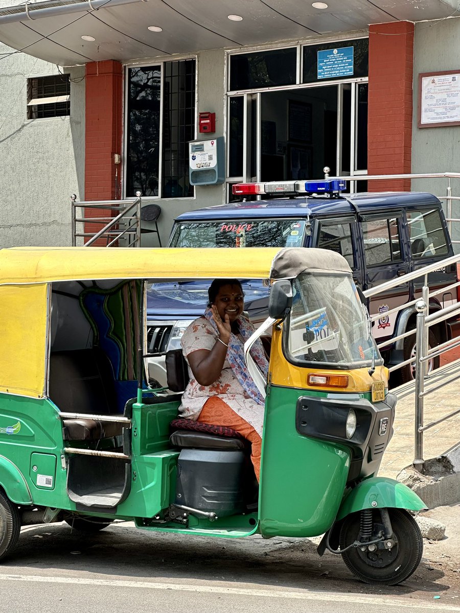 True symbol of courage and resilience! Despite the odds, she navigates the bustling streets of Bangalore behind the wheel of her auto-rickshaw every day. Her determination and grit serve as an inspiration to us all. 
#WomenEmpowerment #BangaloreRising #CourageousWomen #Resilience