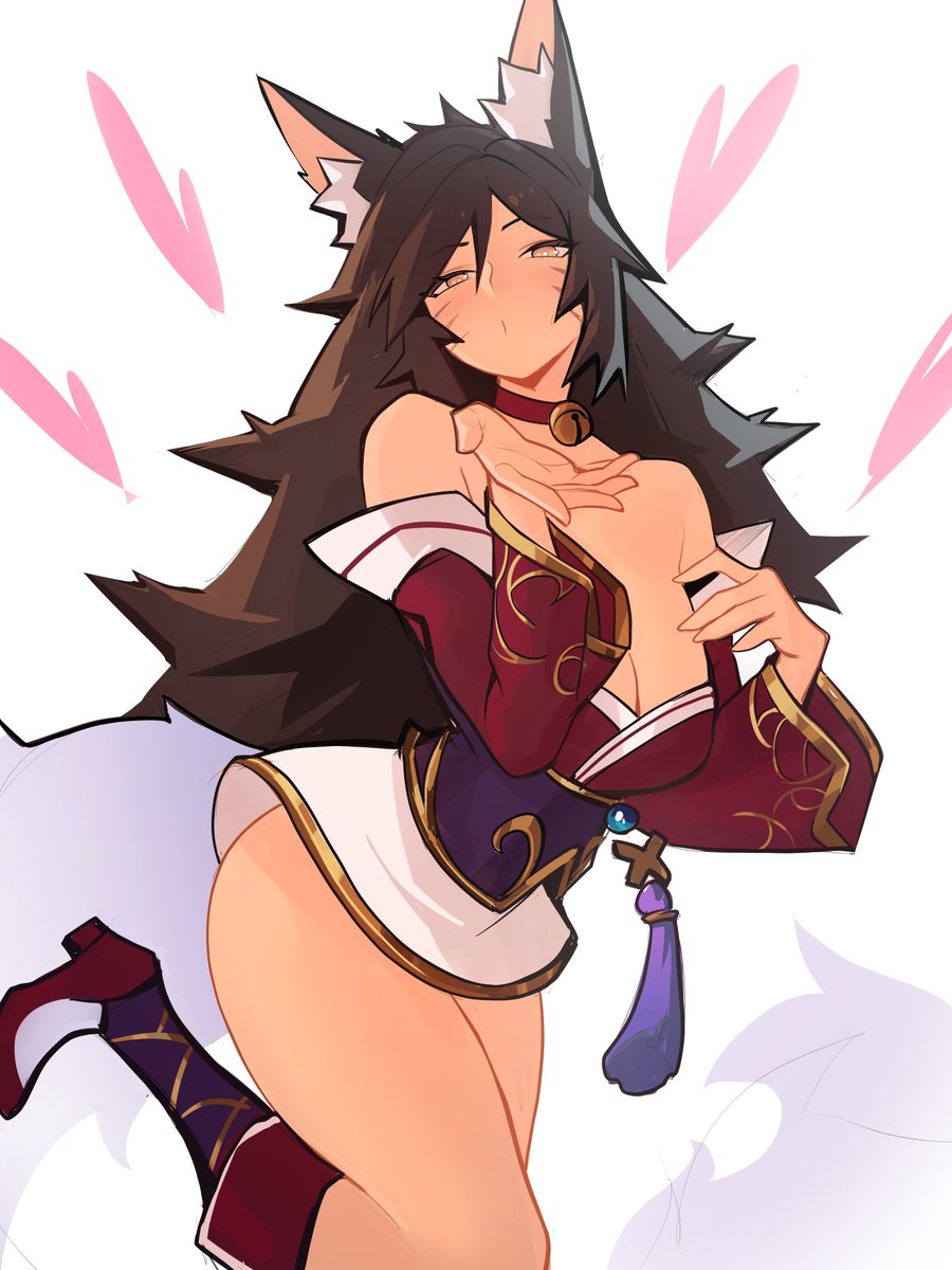 Ahri from League!! She's blowing you a kiss.