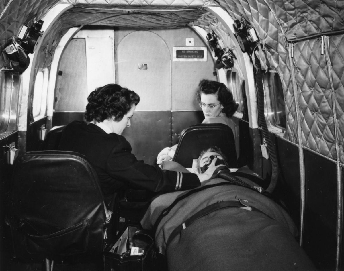 The SK Air Ambulance Service made emergency medical care accessible to people in rural & northern SK. The first flight was made on February 3, 1946. This photo from 1949 shows Chief Flight Nurse Irene Sutherland administering oxygen to a patient (R-A5381(1)). #NationalNursingWeek