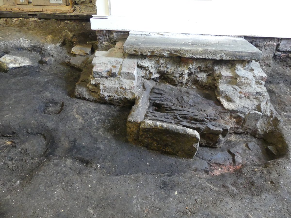 We may study #archaeology, but don't usually have a dig actually taking place inside the Dept! Work on the floor of an office has revealed part of a medieval building, including this hearth, thanks to Archaeological Services @ArcDurham. Excavation continues... @durham_uni #Durham