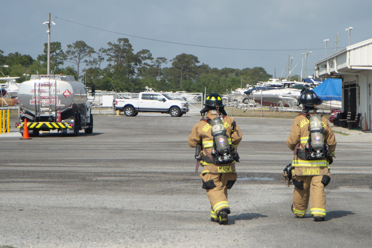 Fire and Emergency Services Gulf Coast (F&ESGC) firemen Arturo Gasca and Gaetano Savino along with Naval Air Station (NAS) Pensacola's Airman Jaheim Smith participate in an exercise May 8 onboard the installation, responding to a simulated oil spill. #NASP #CNRSE