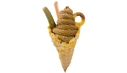 Stampede 2024 - enter....The cheeseburger ice cream. 'This no meat, vanilla infused BBQ flavoured ice cream is served in a waffle cone, dunked in hot cheese, and sprinkled with sesame seeds. Garnished with an onion ring and pickle. Yahoo!'