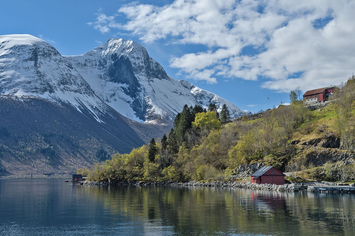 The last couple of weeks on the Norwegian Coastal Express from Bergen up to Kirkenes. Wall to wall sunshine most of the days. This is Hjorundfjorden as spring comes to Norway.