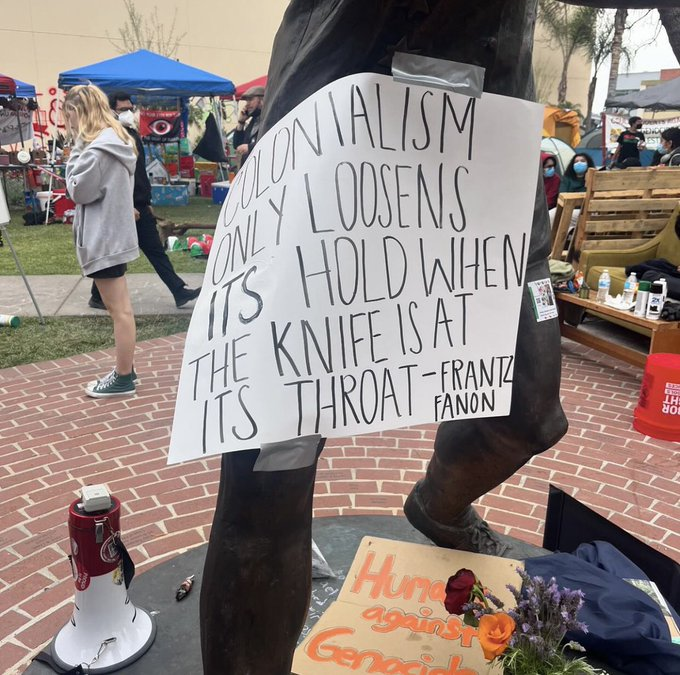 During a pro-t*rror*st protest at @calstate, students and faculty defaced a statue with a sign calling to 'hold a knife to the throat of colonialism.'

Just some 'mostly peaceful' anti-war protestors.