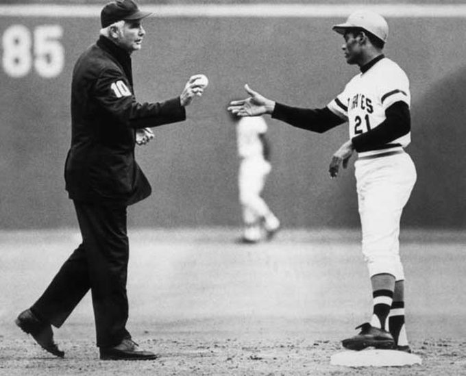 Umpire gives Roberto Clemente his 3000th hit ball, 1972.