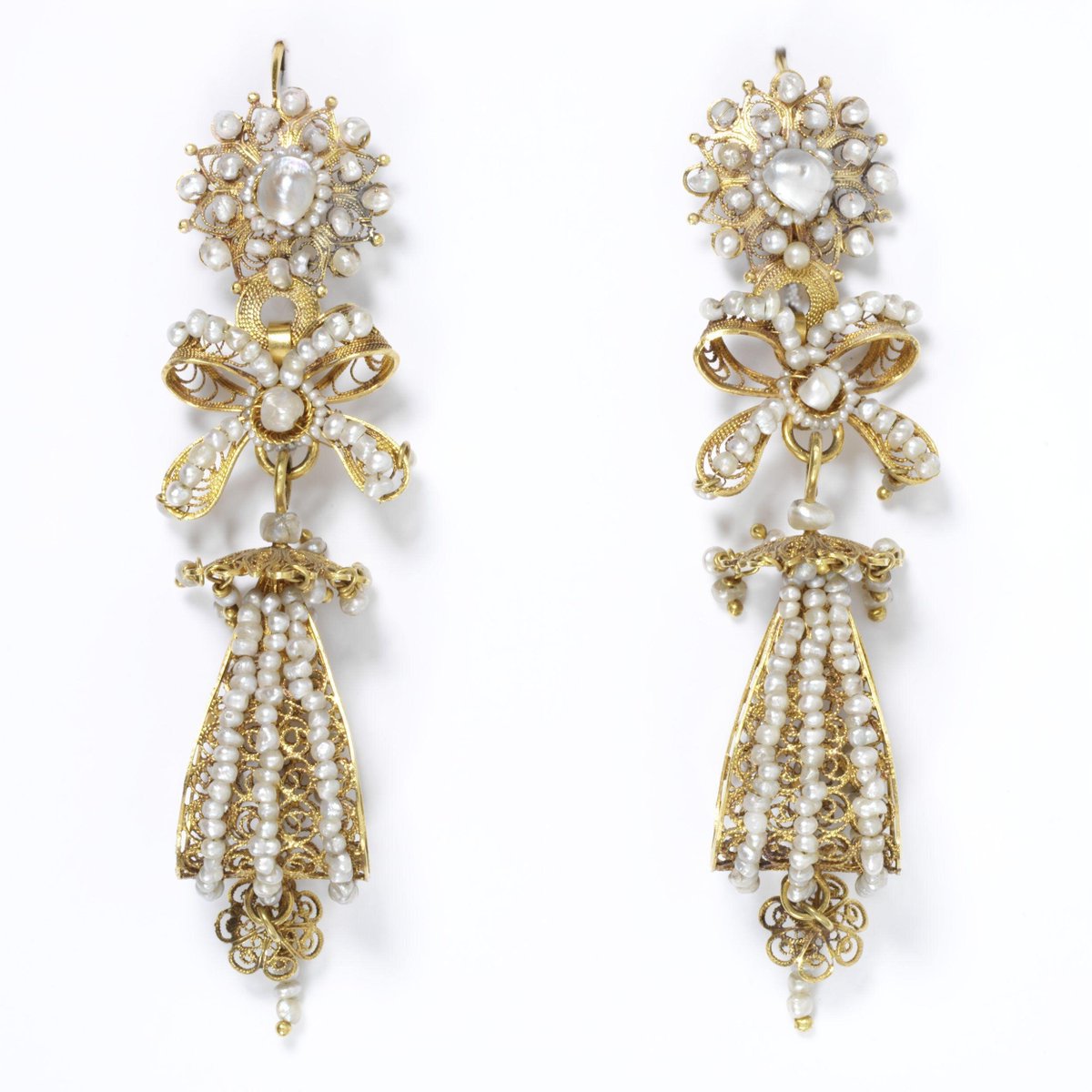 Pair of long gold filigree earrings set with pearls, Salamanca (Spain), 1800-70. Victoria & Albert Museum.