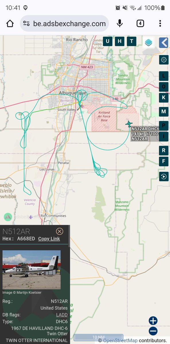 'Twin Otter International' DHC-6-200 Twin Otter N512AR #A668ED in the air over ABQ/Kirtland AFB.