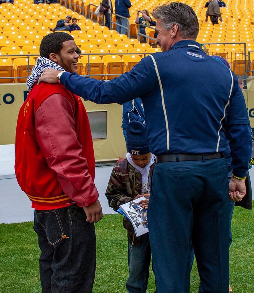 Aaron Donald talking with Dave Wannstedt on a recruiting visit at Pitt in 2009. 📸: Ron Pradetto