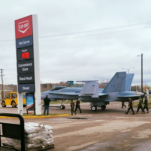 This is something you don't see everyday, a CF-18 jet moving down Main Street ~ and, no, we don't have jet fuel on tap at the Cold Lake Gas Bar!