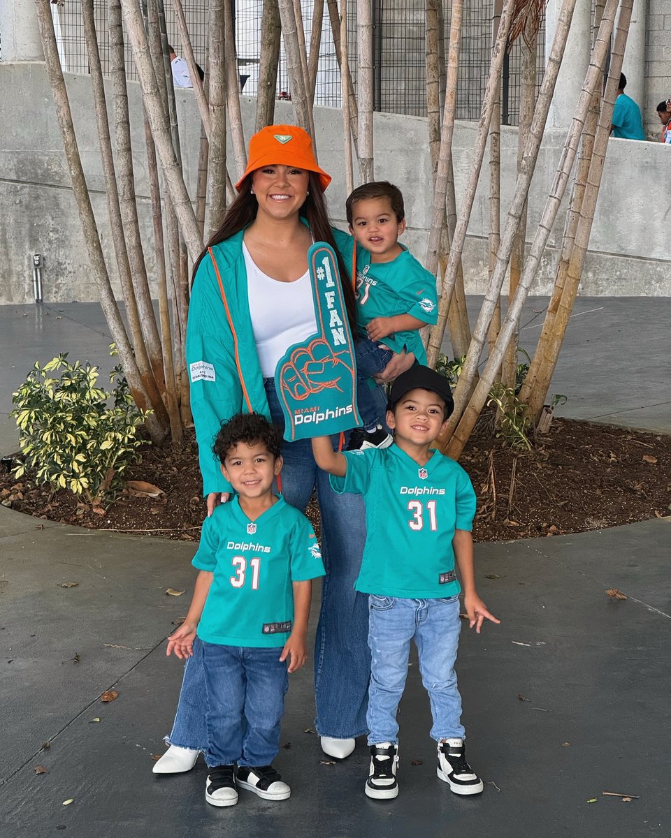 This Mother's Day, take a hint from mom's style playbook. 🐬🧡@devonmostert knows what we're talking about! #miamidolphins #WEARonYOU ⁠ ⁠ Shop mom's favorite @nfl team at the @officialnflshop. ⁠l8r.it/0Ofe ⁠ 📷 @devonmostert/IG