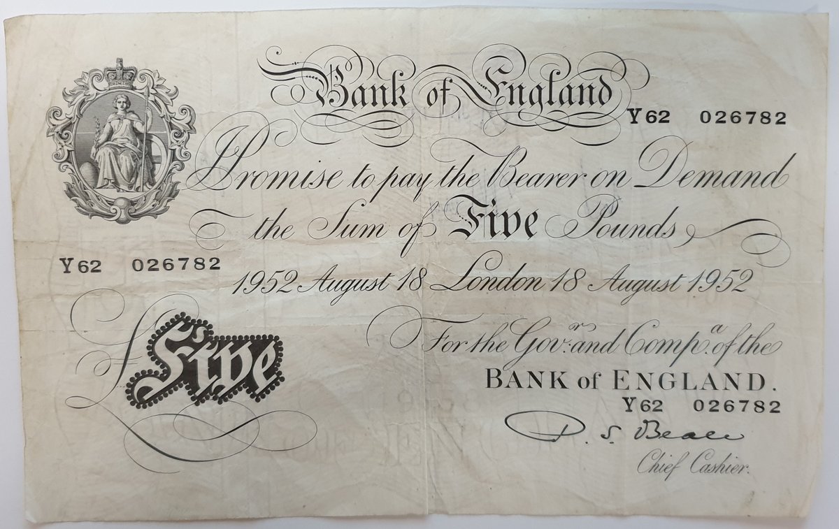 A white £5 banknote. Chief Cashier P.S. Beale 1952