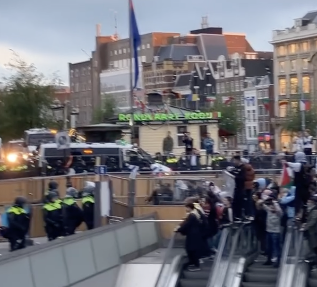 what is happening in amsterdam right now is absolutely unprecedented in my lifetime! direct action protesters have just managed to put a fence around the fucking cops in the fucking city center of amsterdam! In our lifetime Falastiin will be free and Zionism will fall!