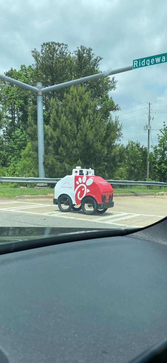 Chick-Fil-A delivery robot spotted crossing the street in Woodstock. 🤖