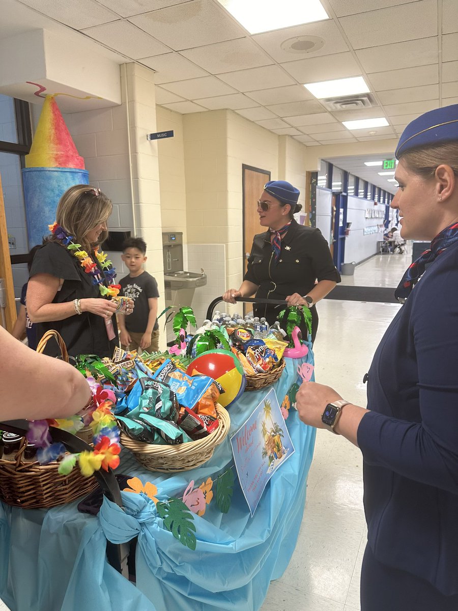 Now boarding Scottie Airlines to Hawaii! 🌺🌴 We are so lucky to have our very own PTA flight attendants providing teachers with beverages and snacks for Teacher Appreciation Week! ✈️ Smooth skies ahead! #WeAreHerricks @HerricksSchools