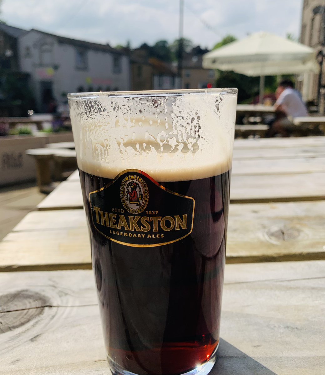 A delicious pint of the deep-flavoured, iconic @Theakston1827 Old Peculier today. In exceptional condition. It was immensely enjoyed in the sunshine at The Castle Inn, #Skipton . 🍻👍👏😋