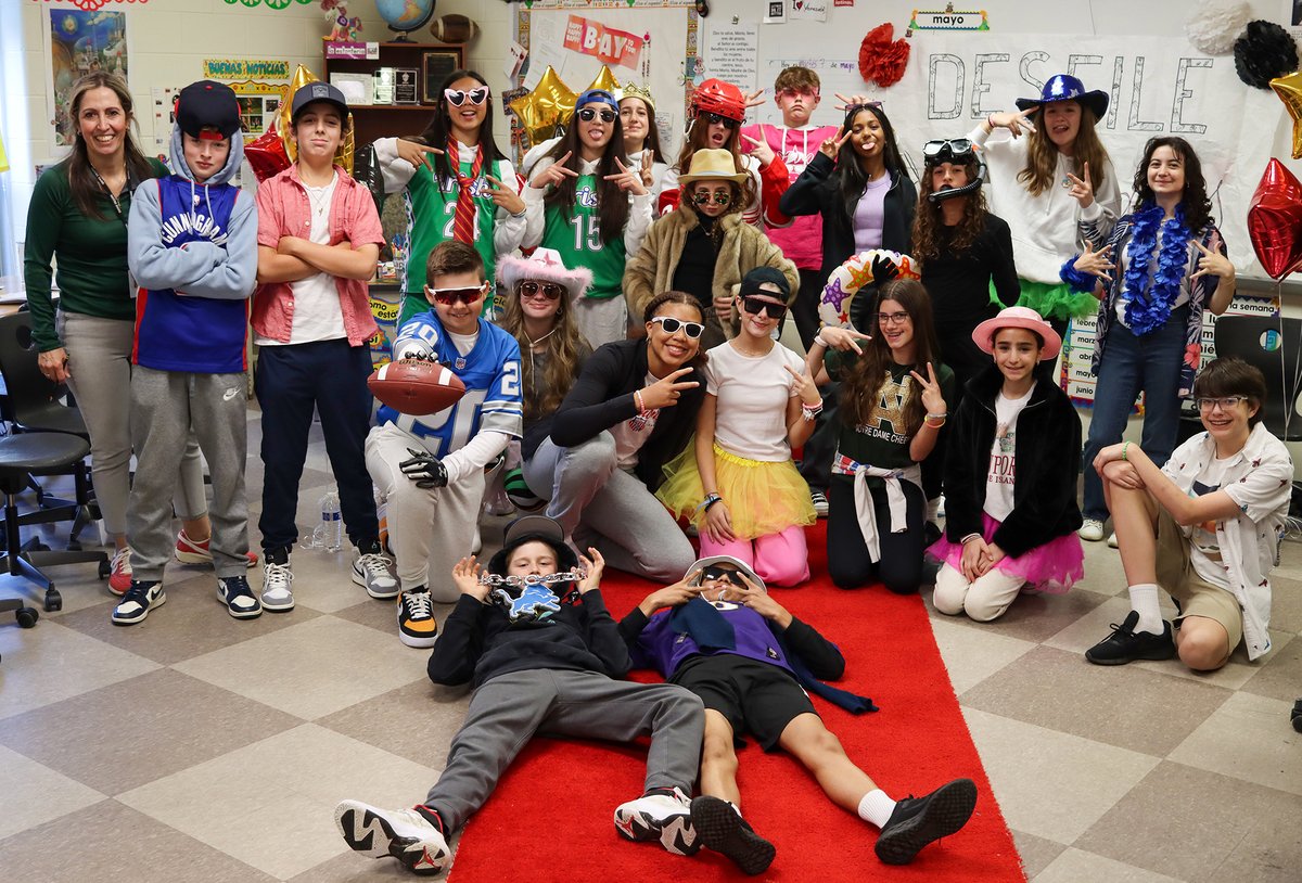 It wasn't quite the Met Gala, but students in Sra. Aguilar's middle school Spanish classes walked the red carpet today in a Spanish language fashion show, the culmination of learning the vocabulary of clothing, jewelry, etc., in the fashion industry. More on FB. #LearningIsFun