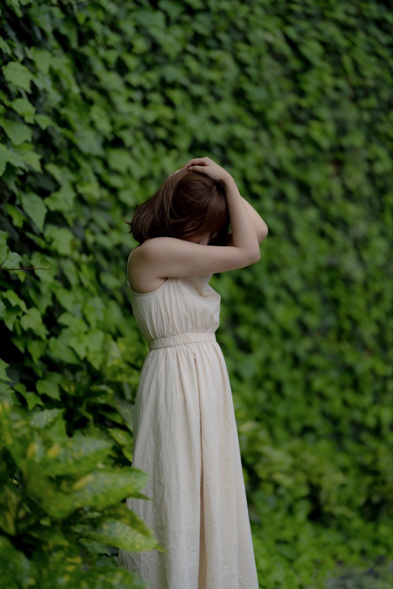 a woman in the green.