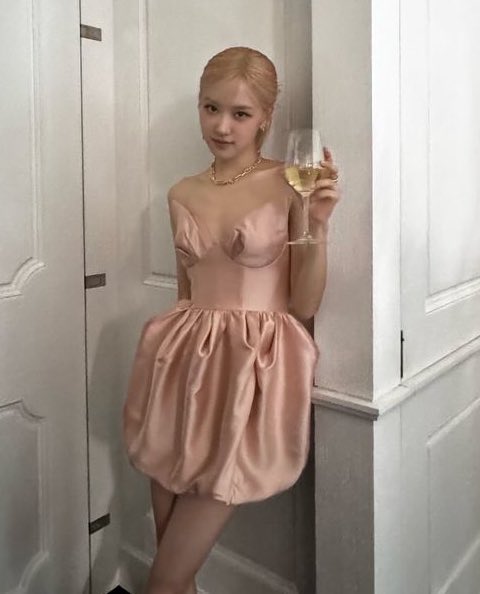 rosé and her glass of wine