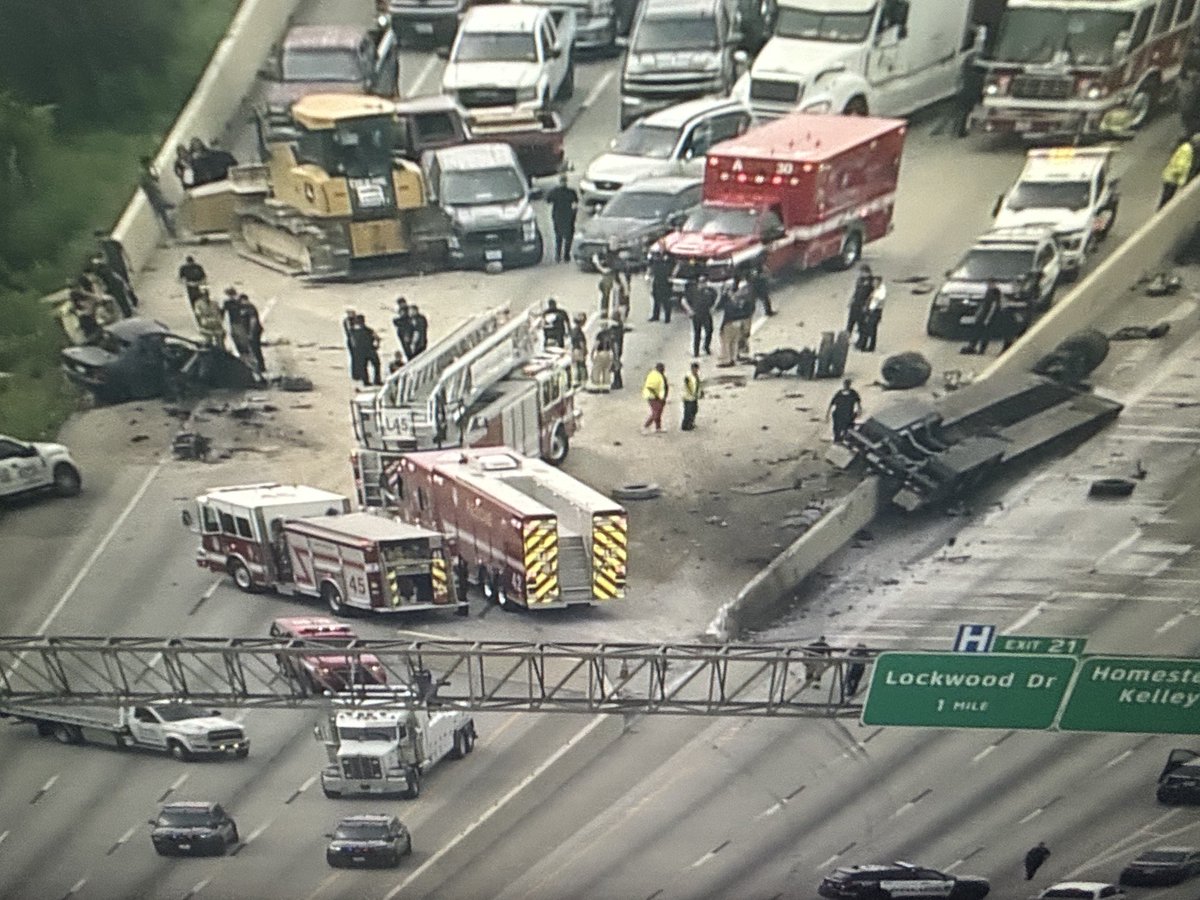 A major traffic snarl in northeast Houston. Total closure of the 610 North Loop near Homestead Rd. An 18 wheeler collided with a car and the yellow bulldozer on the left fell off the big rig. One person taken to the hospital, condition unknown. Image from Air 11. #khou11