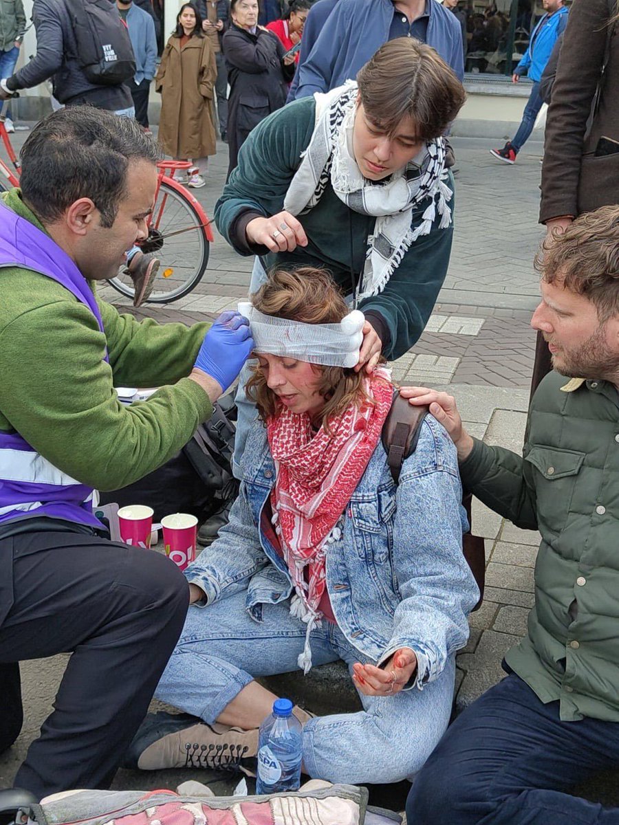 The police in Netherlands split a woman's head open who was protesting against the genocide in Palestine for the sake of literal Nazis of 2024, Israel!