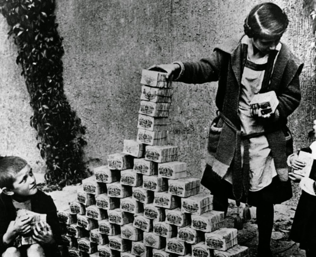 “German children playing with stacks of money during the hyperinflation period of the Weimar Republic, 1922.”

The only difference between the shit we use as currency and this kids stack is………..

TIME. 

And you have less time than you think.