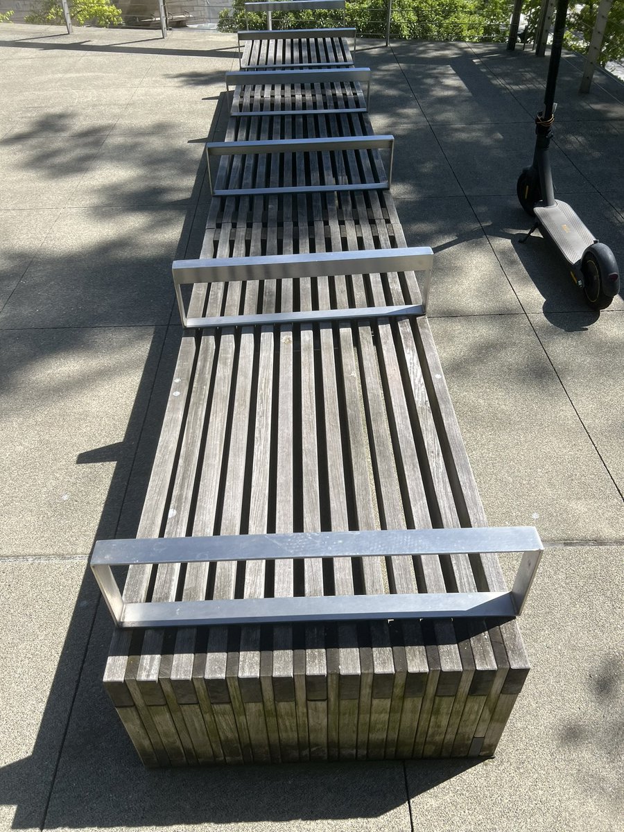 deuceohsixx's tweet image. The armrests on this bench are not there so you can rest your arms. They are there to keep people from lying down on them. #HostileArchitecture 

At Seattle City Hall