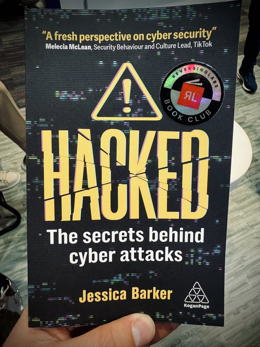 Got myself a signed book from @drjessicabarker at #RSAC! 🖤💛
